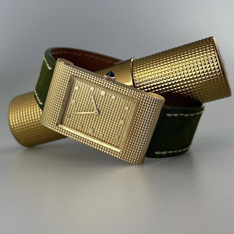 Typical example of a Boucheron reflet watch. This example has a 'clous de paris' dial and case. It runs on an a manual wound movement.