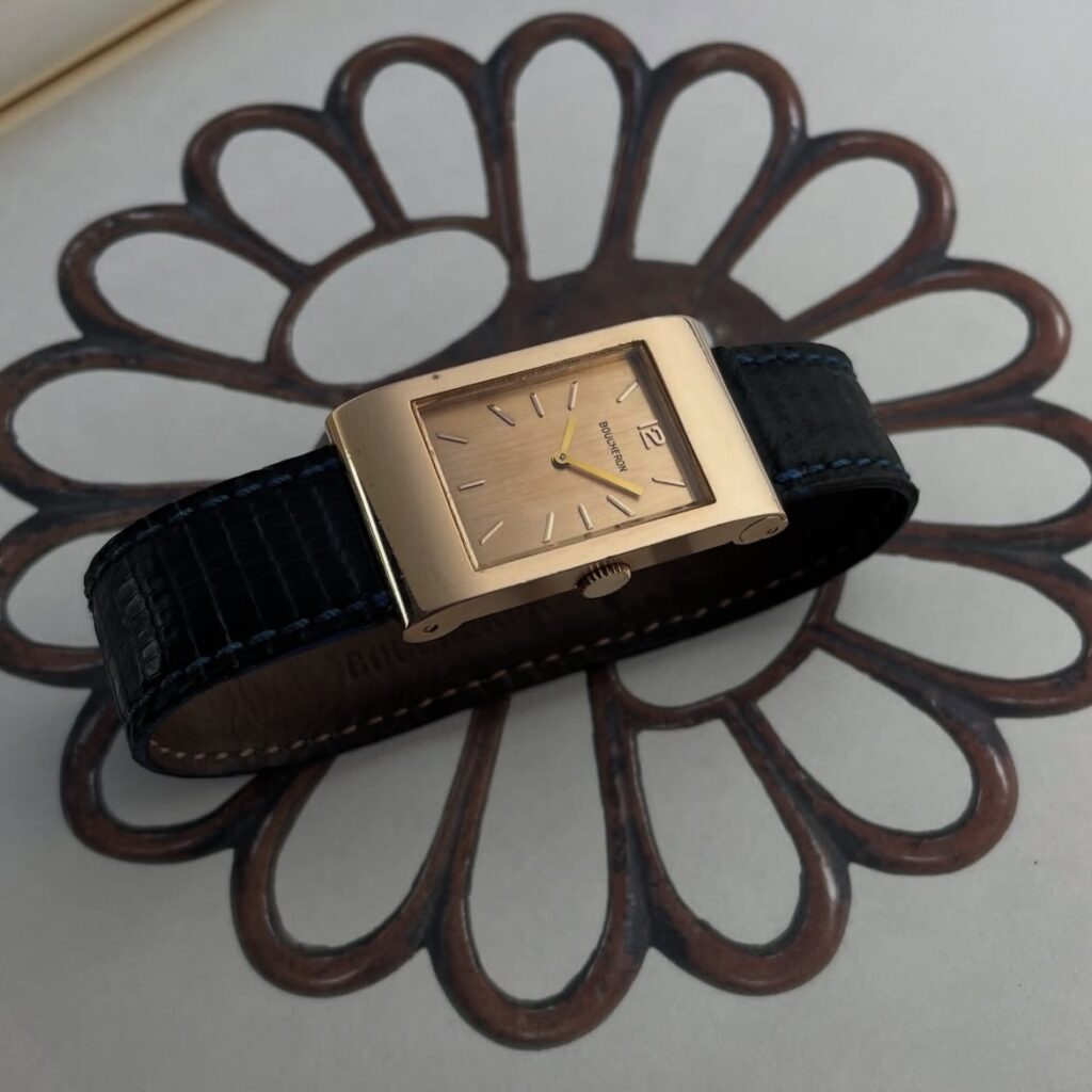 A Boucheron reflet from 1960 with an unusual smooth finishing case and brushed dial. 