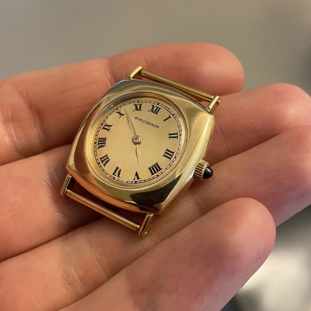 Boucheron cushion case vintage watch with characteristic solid gold springbars